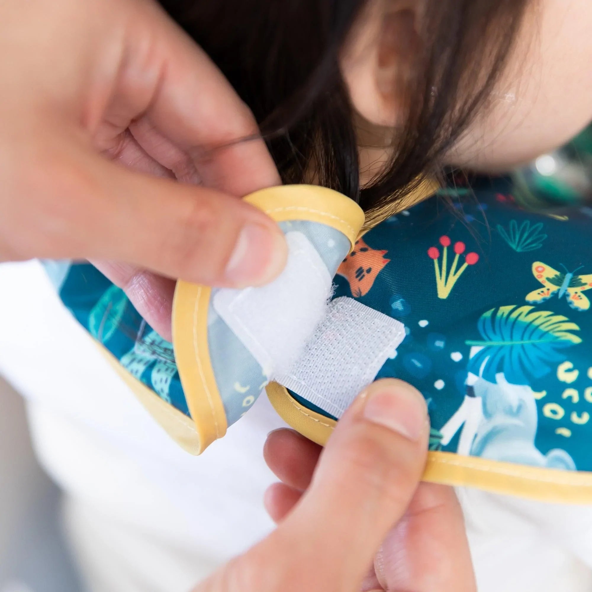 Swap pocket bib - Jungle & Animal Prints