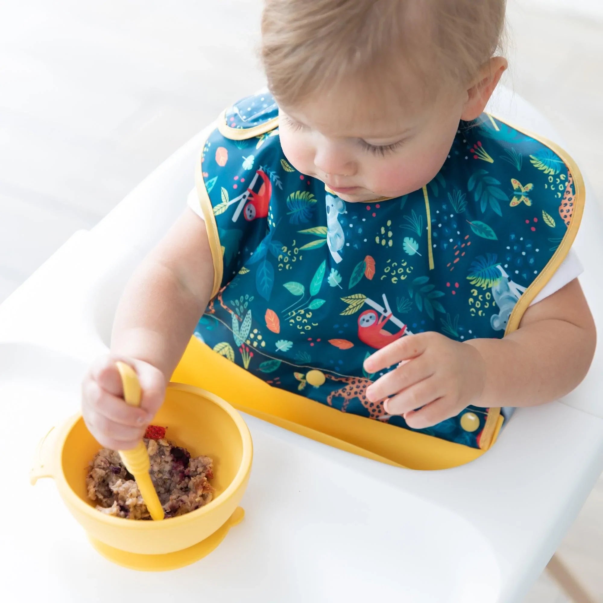 Swap pocket bib - Jungle & Animal Prints